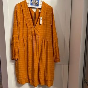 Anthropologie dress with pockets gold NWT.